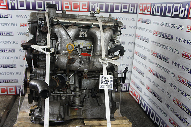 Двигатель вид с боку TOYOTA 1NZ-FXE
