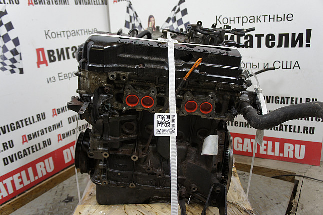 Двигатель вид с боку Nissan QG18DE