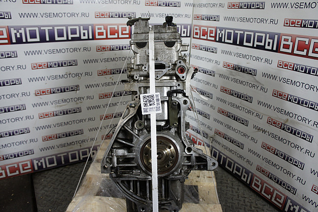 Двигатель вид с боку SUZUKI J20A