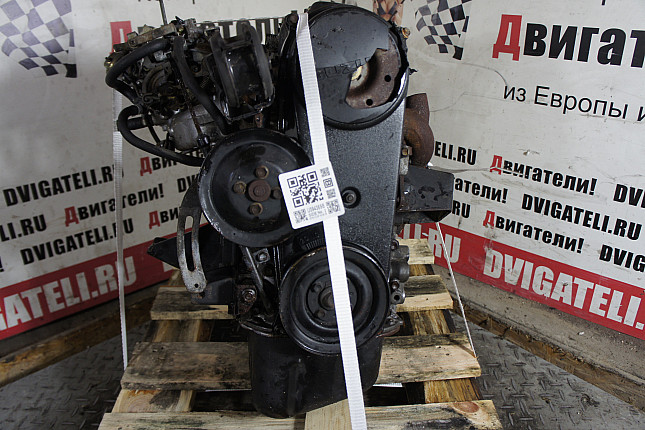 Двигатель вид с боку Suzuki G13A