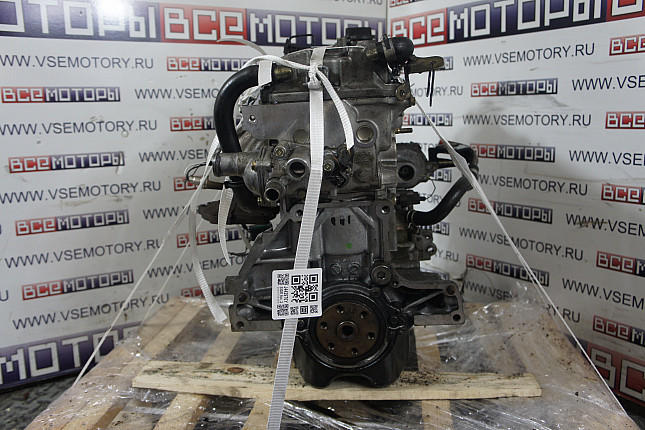 Двигатель вид с боку NISSAN CGA3DE